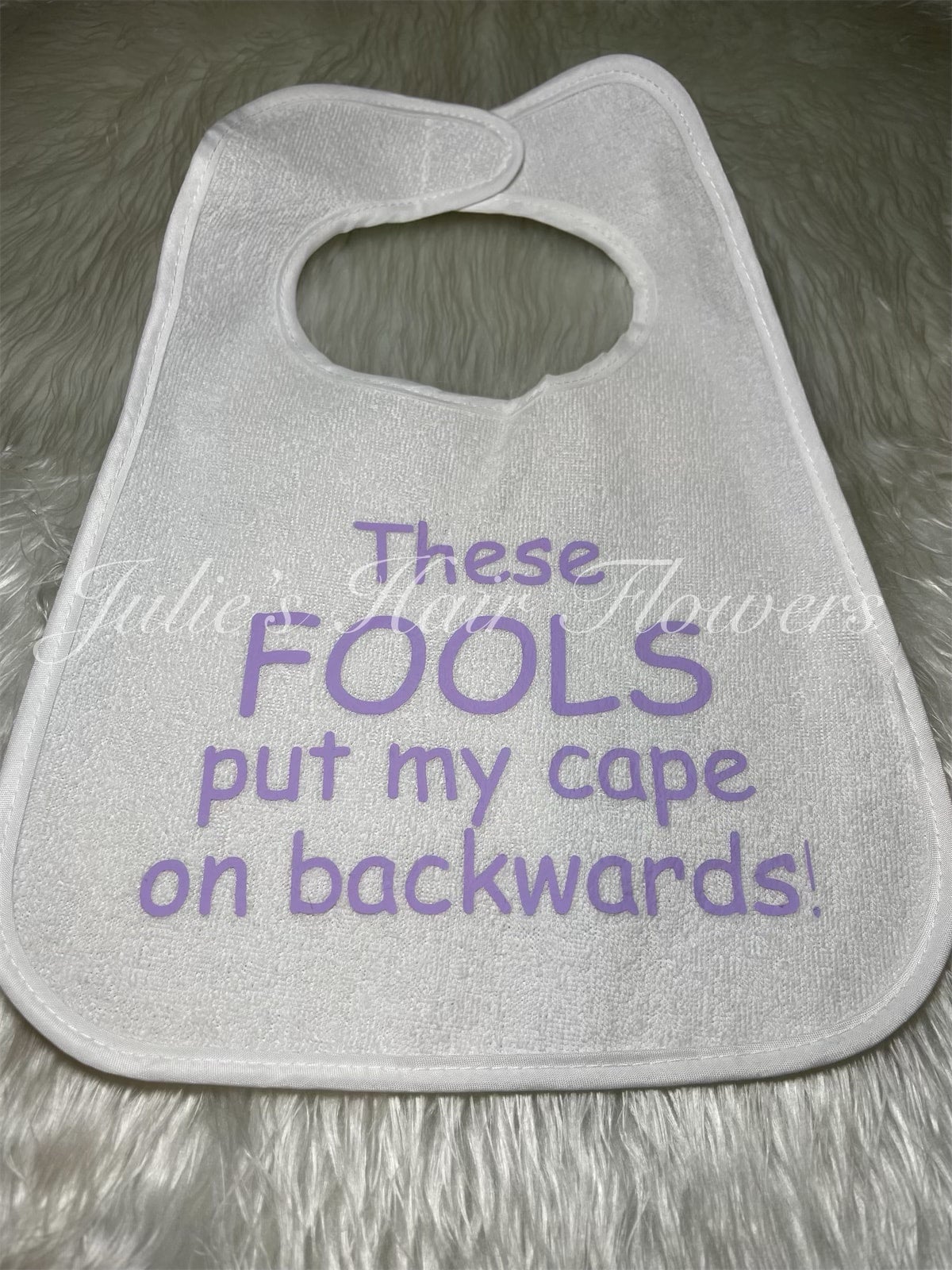 These fools put my cape on backwards bib deals